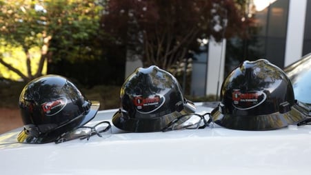 3 Hard Hats on a Truck